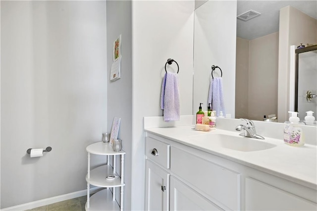 25201 W 149th Ter, Olathe, KS 66061 - bathroom with vanity, a shower, and tile patterned flooring