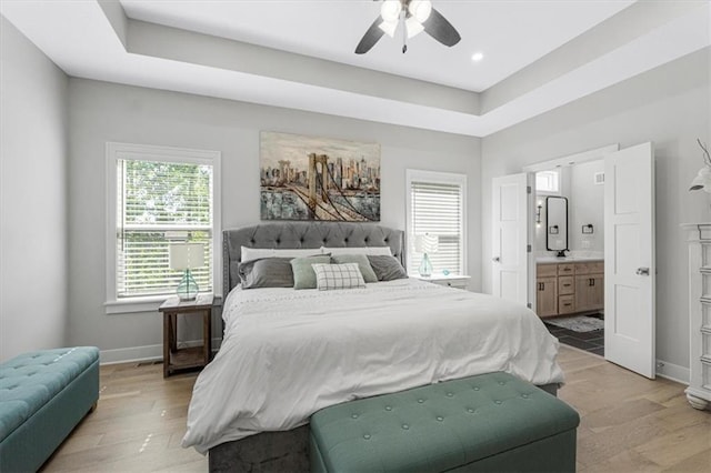546 N Oakwood Ln, Tonganoxie, KS 66086 - bedroom featuring light wood-style flooring, ensuite bath, baseboards, ceiling fan, and recessed lighting