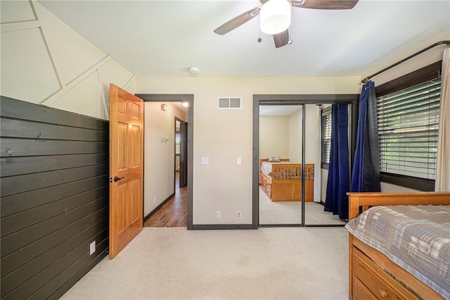 7277 SW Karen Rd, Trimble, MO 64492 - bedroom with light colored carpet, a closet, and ceiling fan