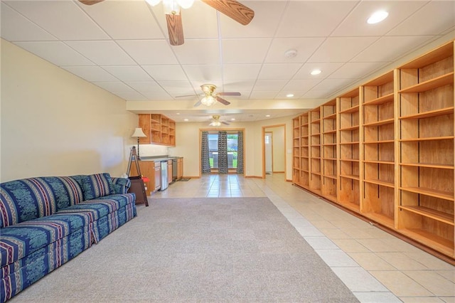 7277 SW Karen Rd, Trimble, MO 64492 - unfurnished living room with ceiling fan, light tile patterned flooring, recessed lighting, and light carpet