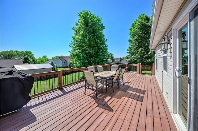 7277 SW Karen Rd, Trimble, MO 64492 - deck with outdoor dining area and a yard