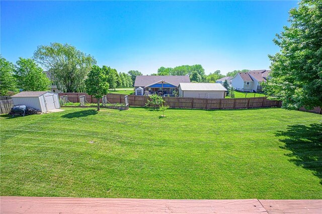 7277 SW Karen Rd, Trimble, MO 64492 - view of yard with a storage unit and an outdoor structure