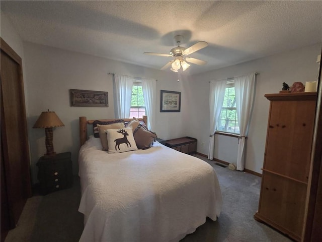 27349 Karrs Park Ave, Warsaw, MO 65355 - carpeted bedroom featuring a ceiling fan, a textured ceiling, and baseboards