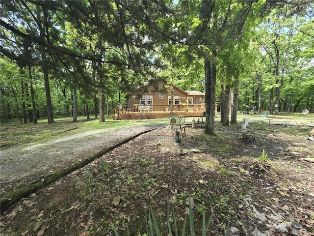 27349 Karrs Park Ave, Warsaw, MO 65355 - view of yard featuring a wooden deck and a view of trees