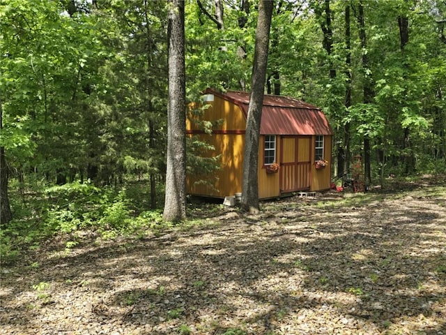 27349 Karrs Park Ave, Warsaw, MO 65355 - view of shed with a wooded view