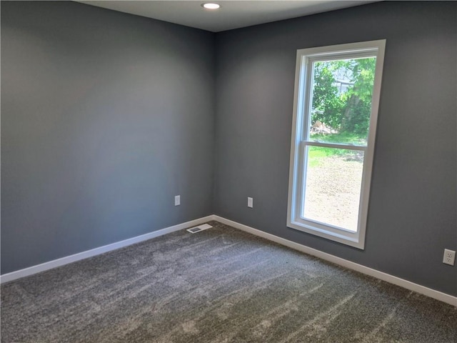 449 E Market St, Warrensburg, MO 64093 - carpeted empty room featuring baseboards and recessed lighting