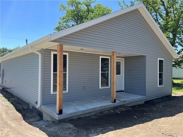 449 E Market St, Warrensburg, MO 64093 - back of property featuring covered porch
