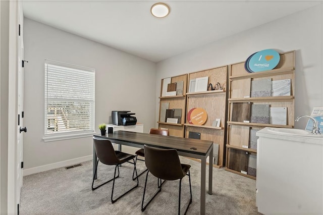 402 Woodview Dr, Raymore, MO 64083 - carpeted office space with baseboards