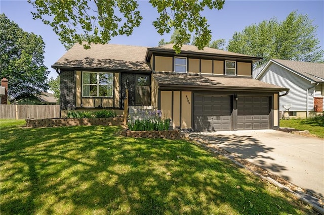 split level home with a garage and concrete driveway