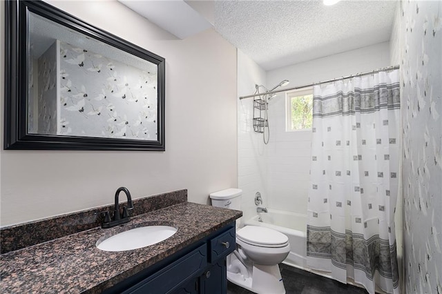 full bathroom featuring a textured ceiling, vanity, toilet, and shower / bathtub combination with curtain