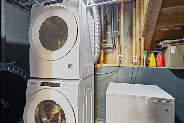 washroom with estacked washer and dryer