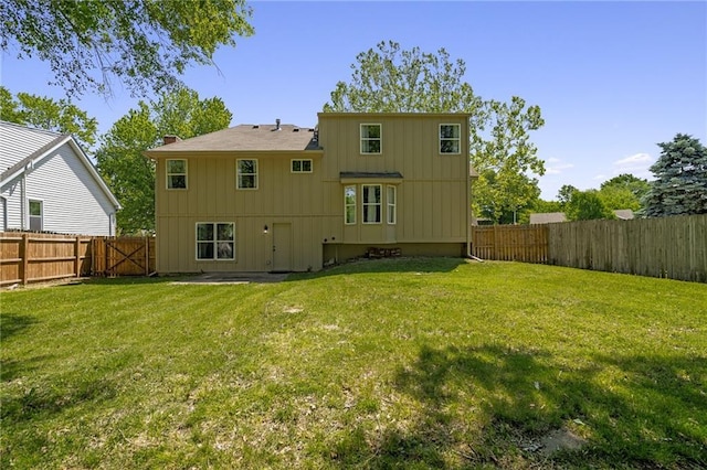 back of house featuring board and batten siding