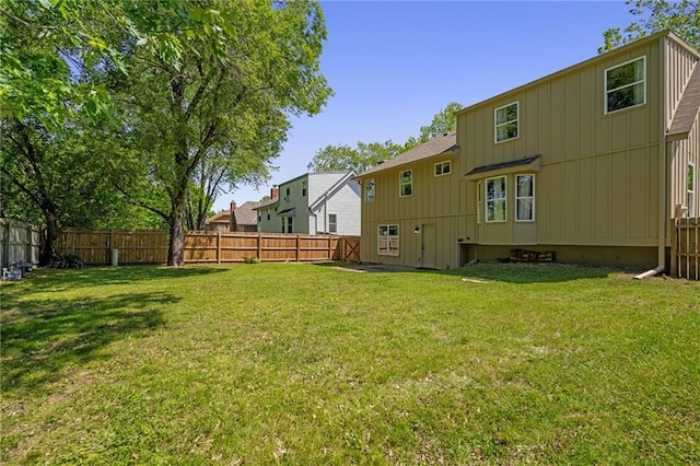 back of house with board and batten siding