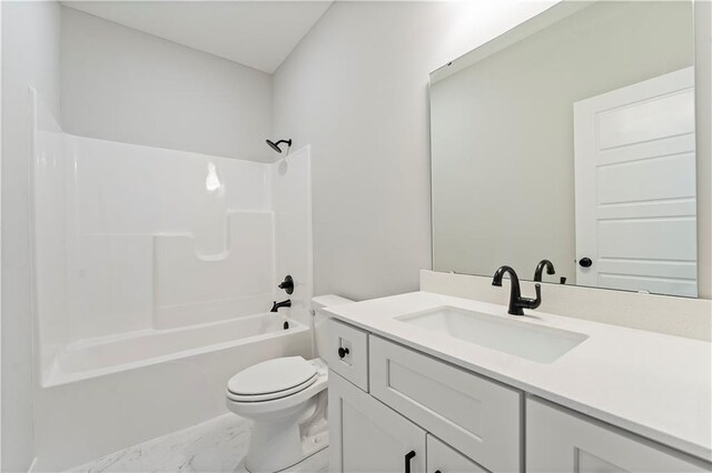 501 Woodview Dr, Raymore, MO 64083 - bathroom featuring marble look tile flooring, toilet, shower / bathtub combination, and vanity