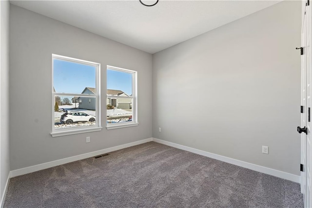 501 Woodview Dr, Raymore, MO 64083 - unfurnished room featuring carpet floors and baseboards