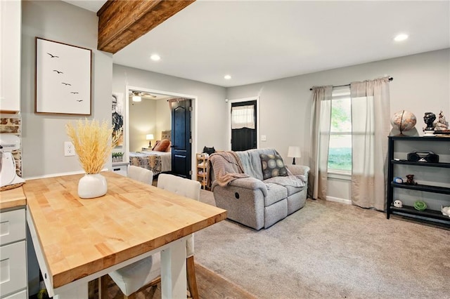 living room with recessed lighting and baseboards