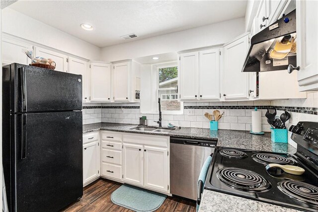 kitchen with stainless steel appliances, a sink, under cabinet range hood, white cabinets, and dark wood-type flooring