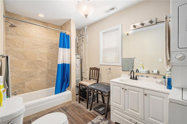 full bathroom featuring toilet, shower / bath combination with curtain, vanity, gas water heater, and wood tiled floors