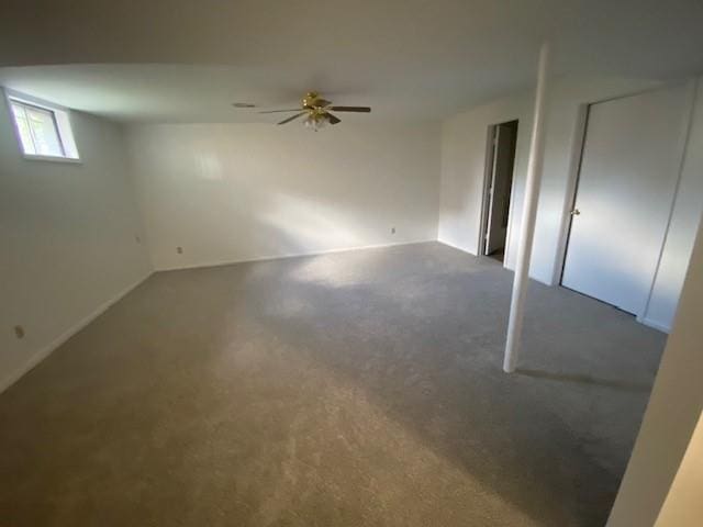unfurnished bedroom with carpet floors and baseboards