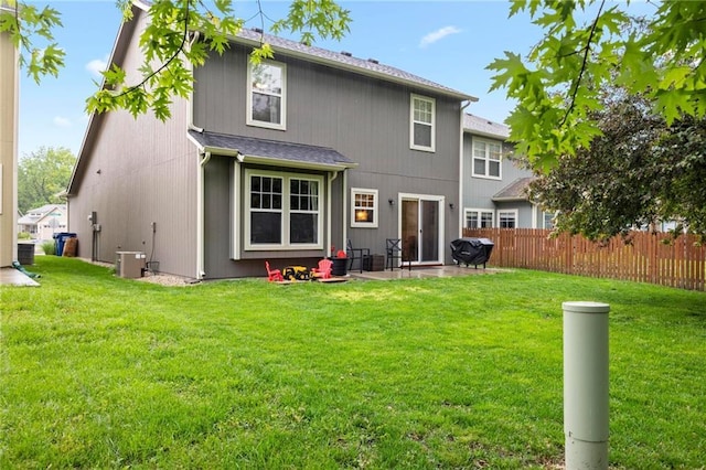rear view of house with a patio