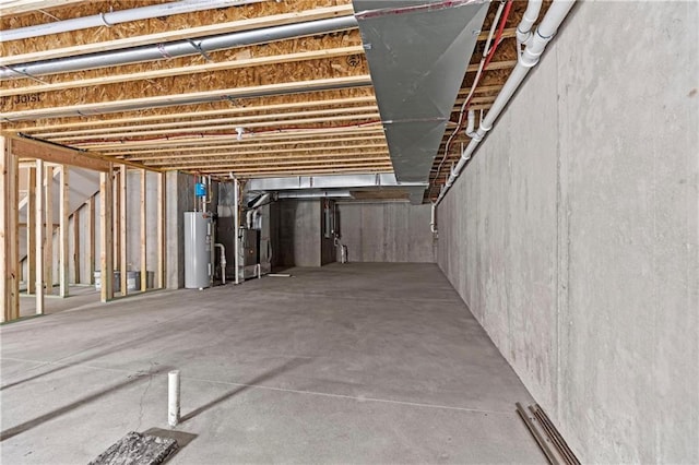unfinished below grade area with water heater and heating unit