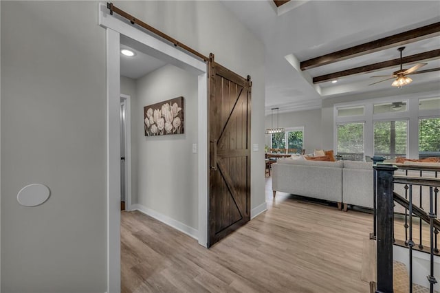 18235 NW 127th St, Platte City, MO 64079 - corridor with a barn door, light wood-type flooring, beamed ceiling, baseboards, and recessed lighting