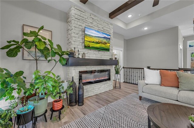 18235 NW 127th St, Platte City, MO 64079 - living area featuring wood finished floors, a fireplace, recessed lighting, and a ceiling fan