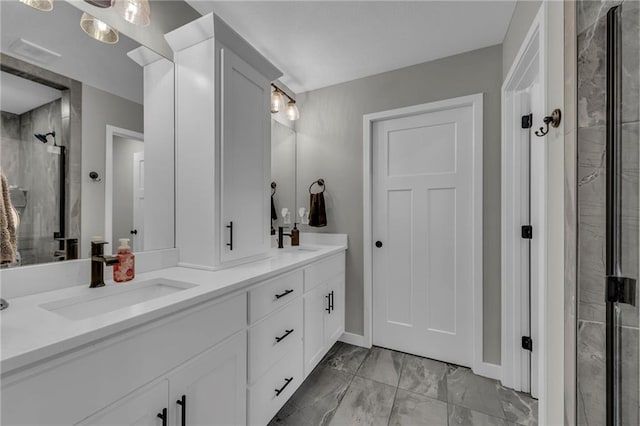 18235 NW 127th St, Platte City, MO 64079 - full bathroom featuring a shower stall, marble finish flooring, double vanity, and baseboards