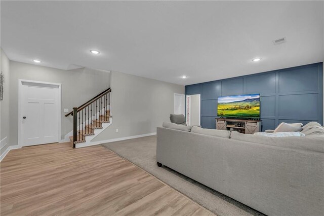 18235 NW 127th St, Platte City, MO 64079 - living area featuring stairway, light wood-style flooring, baseboards, and recessed lighting