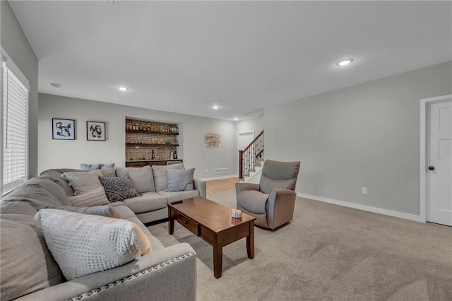 18235 NW 127th St, Platte City, MO 64079 - living room featuring stairway, recessed lighting, baseboards, and light colored carpet