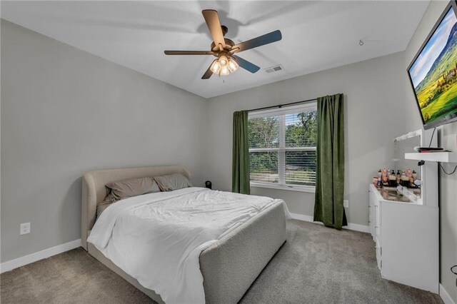 18235 NW 127th St, Platte City, MO 64079 - bedroom with light colored carpet, baseboards, and ceiling fan