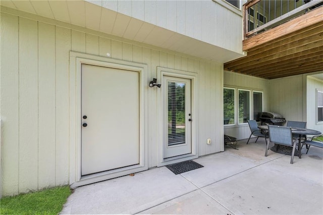 18235 NW 127th St, Platte City, MO 64079 - property entrance featuring a patio and outdoor dining space