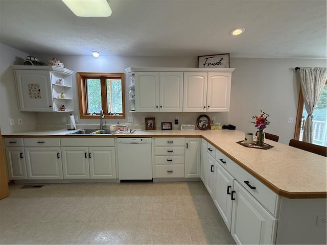 727 Serenity Loop, Maryville, MO 64468 - kitchen with dishwasher, a sink, a peninsula, healthy amount of natural light, and recessed lighting