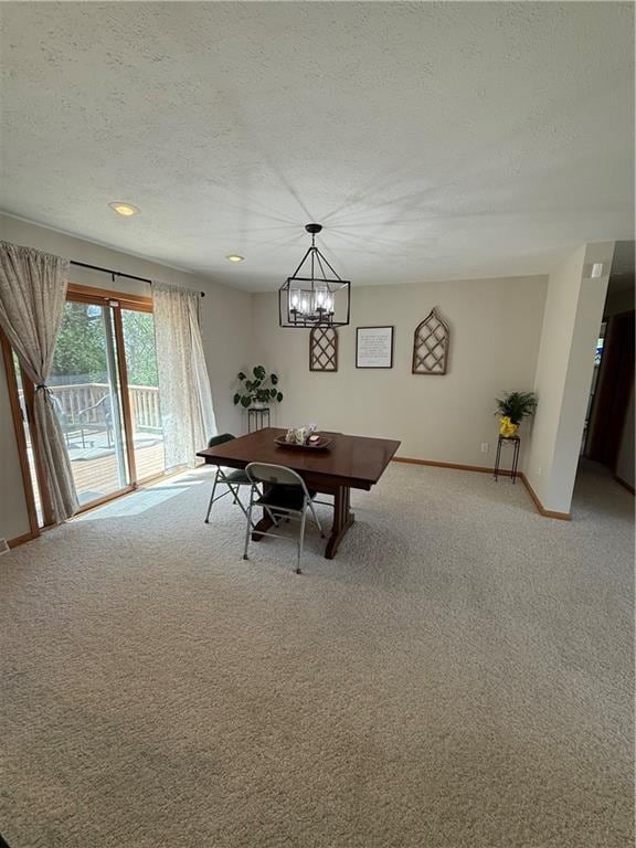 727 Serenity Loop, Maryville, MO 64468 - dining space featuring light carpet, baseboards, a textured ceiling, a chandelier, and recessed lighting