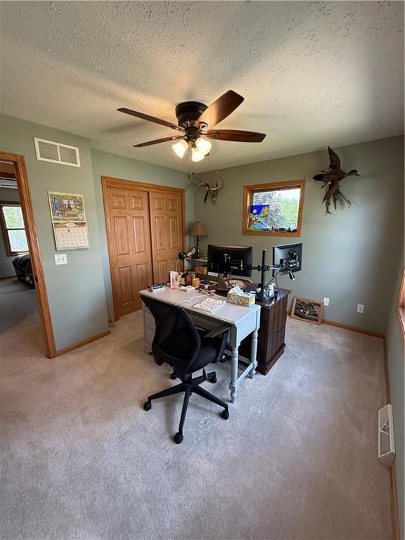 727 Serenity Loop, Maryville, MO 64468 - office space featuring light colored carpet, a textured ceiling, a ceiling fan, and baseboards