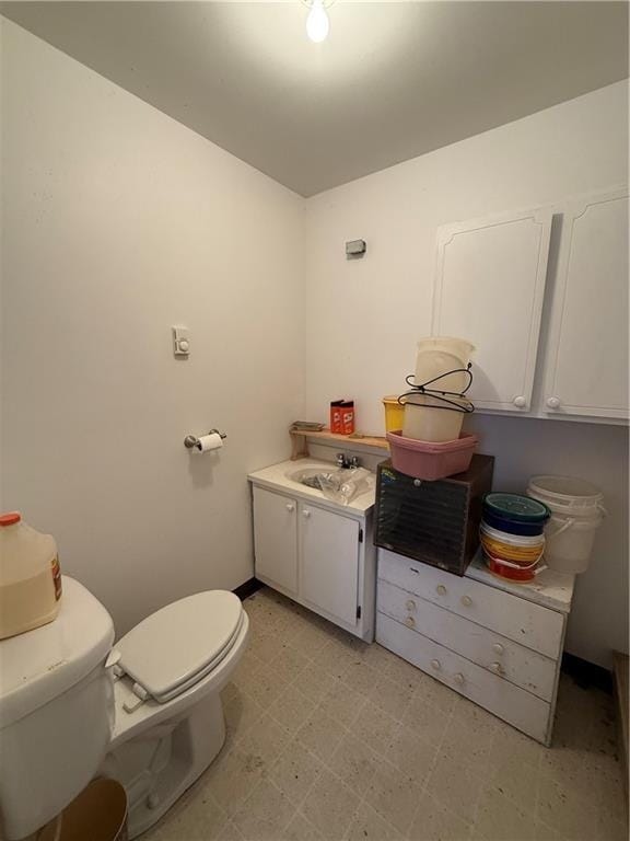727 Serenity Loop, Maryville, MO 64468 - half bath featuring tile patterned floors, toilet, and a sink