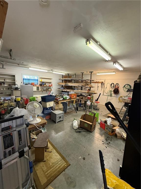727 Serenity Loop, Maryville, MO 64468 - garage with a workshop area