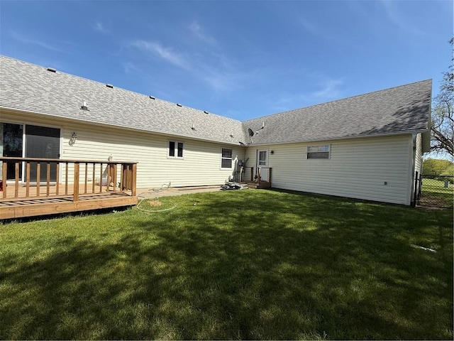 727 Serenity Loop, Maryville, MO 64468 - back of house featuring a wooden deck and roof with shingles