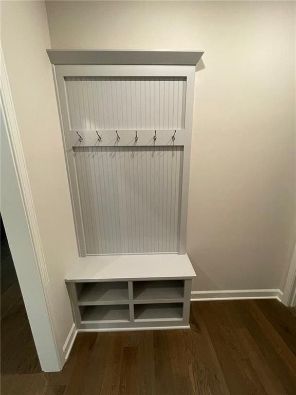 10617 N Fisk Ave, Kansas City, MO 64154 - mudroom with baseboards and dark wood finished floors