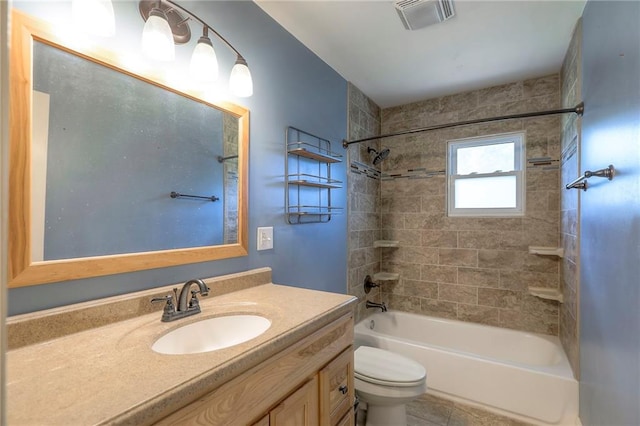 11205 E 49th St, Kansas City, MO 64133 - bathroom with vanity, tub / shower combination, and toilet
