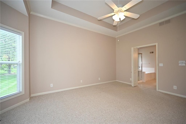 3112 NW 86th St, Kansas City, MO 64154 - unfurnished room with healthy amount of natural light, a ceiling fan, light colored carpet, and ornamental molding