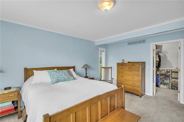 1758 Labette Rd, Ottawa, KS 66067 - bedroom featuring light carpet, crown molding, a spacious closet, a closet, and baseboards