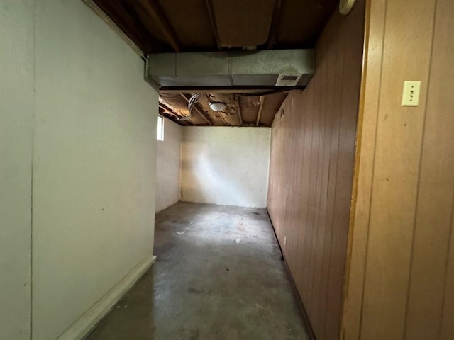1606 N Ponca Dr, Independence, MO 64058 - below grade area featuring wood walls