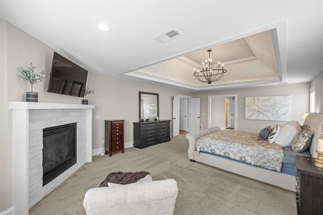 15624 Delmar St, Overland Park, KS 66224 - bedroom with a raised ceiling, a fireplace, carpet, a chandelier, and baseboards