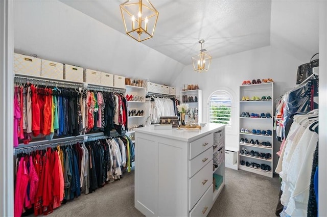 15624 Delmar St, Overland Park, KS 66224 - spacious closet featuring carpet flooring, a chandelier, and lofted ceiling