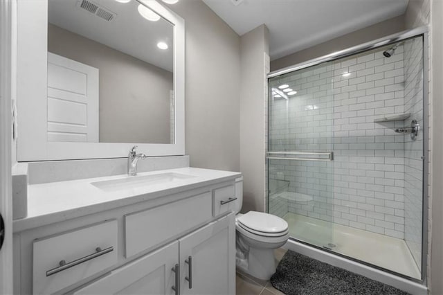 15624 Delmar St, Overland Park, KS 66224 - bathroom with a shower stall, vanity, toilet, tile patterned flooring, and recessed lighting