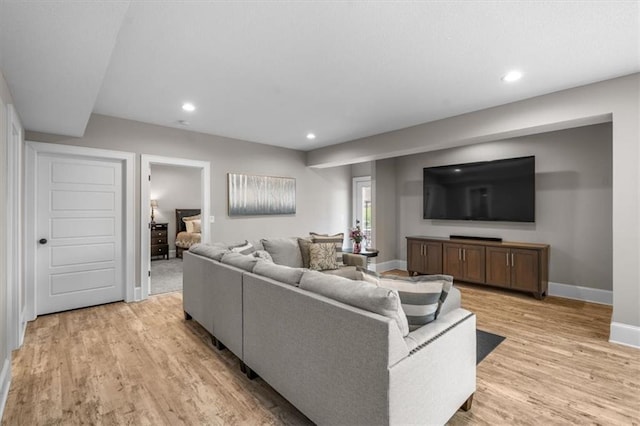 15624 Delmar St, Overland Park, KS 66224 - living area featuring light wood-style floors, baseboards, and recessed lighting