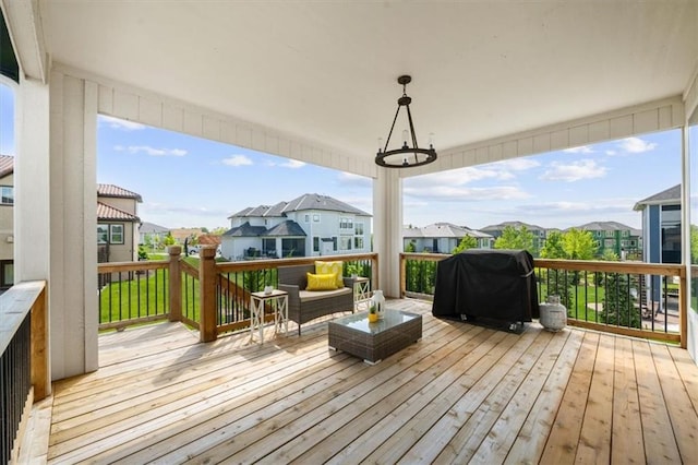 15624 Delmar St, Overland Park, KS 66224 - wooden terrace with area for grilling, a residential view, and an outdoor hangout area