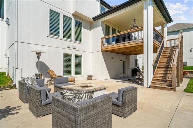 15624 Delmar St, Overland Park, KS 66224 - back of house with an outdoor living space with a fire pit, a patio, and stairs