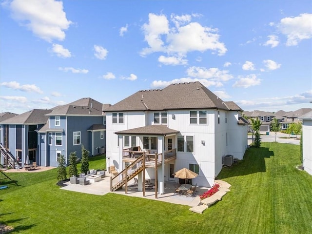 15624 Delmar St, Overland Park, KS 66224 - back of house with a residential view, a patio area, a yard, outdoor lounge area, and stairway